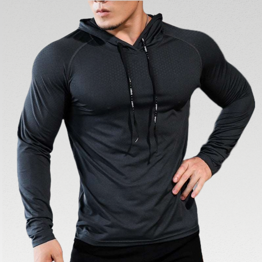 Advance Slim Fit Hoodie – Lightweight polyester fabric with stretch for comfort. Quick-dry material ensures freshness during intense workouts. Flattering slim fit design with drawstring hood for a stylish and functional gym essential. Upgrade your gym wardrobe with comfort and style.