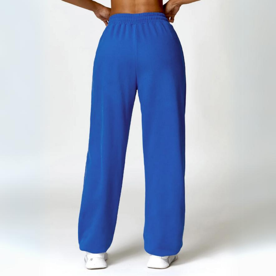 Talena Sweatpants - Premium cotton/poly blend for ultimate softness and durability. Elastic drawstring waistband for tailored comfort. Cuffed ankles for stylish versatility. Elevate your loungewear experience with the cozy and chic Talena Sweatpants.