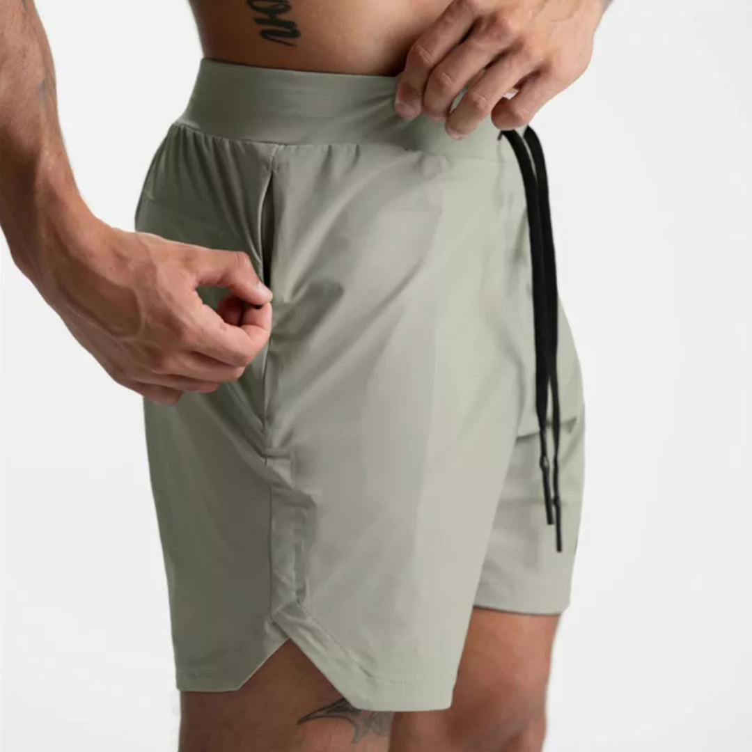 Explore the perfect blend of comfort and style with The Santiago Men's Shorts. Crafted from lightweight polyester, these shorts provide a breathable and airy feel, ensuring comfort in every step. The soft touch against your skin makes them an ideal choice for various casual occasions, elevating your casual wardrobe with ease.