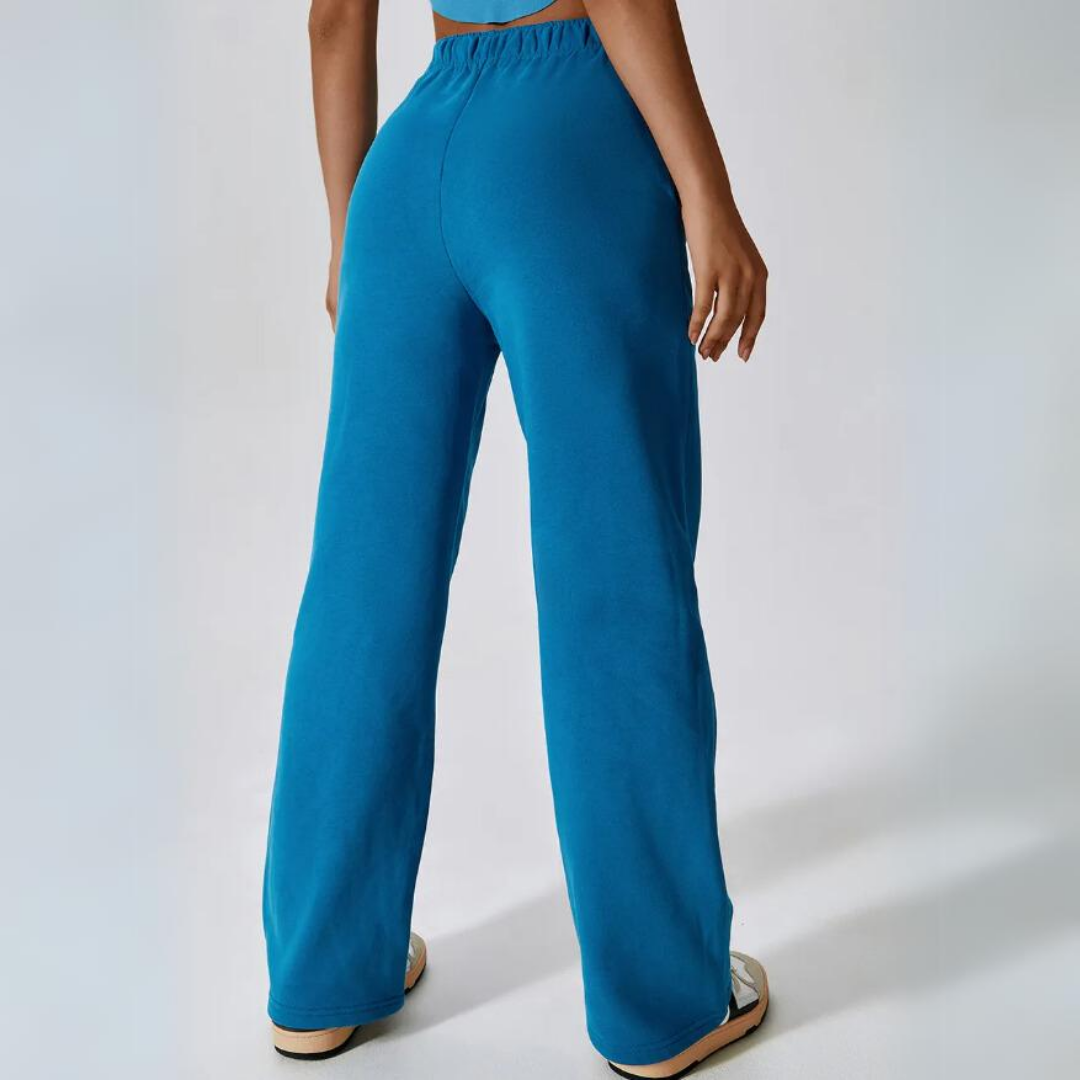 Kira Sweatpants - Elevate your loungewear game with these cozy cotton sweatpants. Featuring an elastic waistband and functional pockets for supreme comfort and everyday convenience.