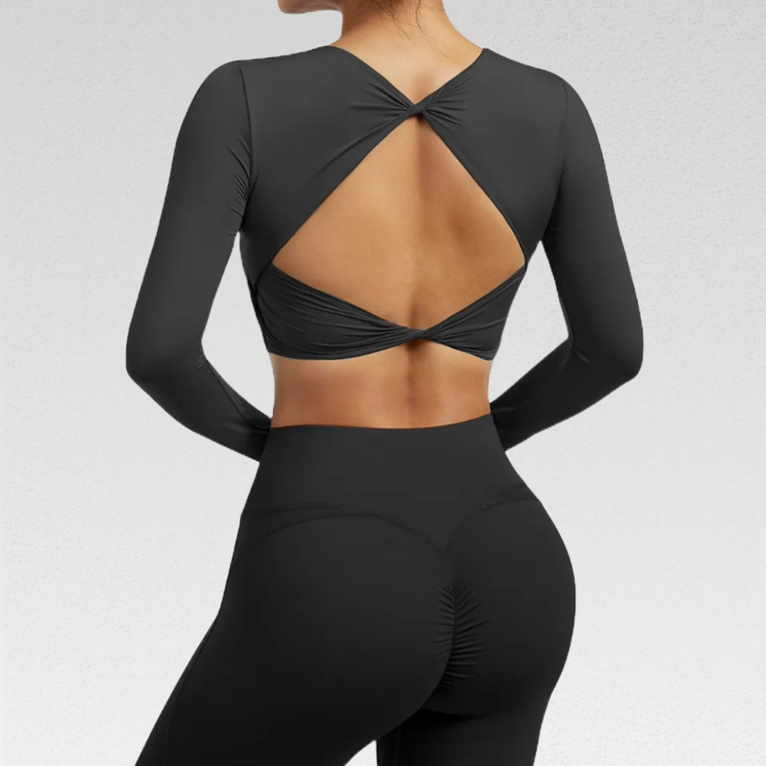 Introducing the Natalia Portrait Back Long Sleeve Shirt – Elevate Your Activewear Collection with Versatile and Trendy Fashion. This Shirt Boasts an Elegant Design with Intricate Portrait Back Detailing, Providing a Fusion of Style and Functionality. Enjoy the Convenience of a Built-in Sports Bra with Removable Pads, Offering Maximum Comfort and Support During Your Workouts. Unleash Unmatched Versatility for Yoga, Running, or Leisurely Activities.