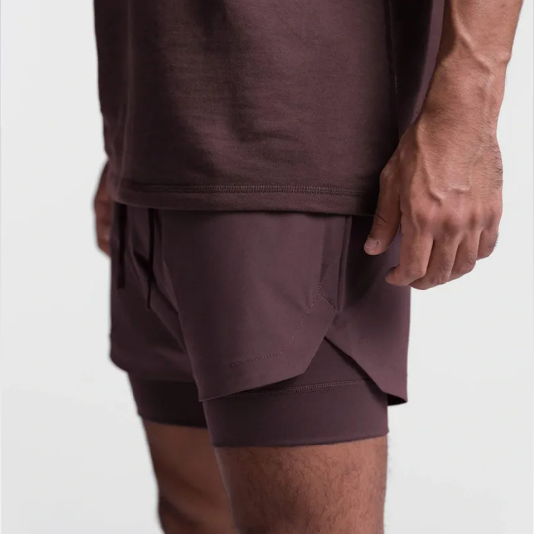 Empire Men's Shorts: Experience the perfect fusion of style and functionality with quick-dry technology, a double-layer design, and functional pockets. Quick dry efficiency for optimal comfort during workouts and outdoor activities. Double layer design for enhanced support and relaxed style. Functional pockets for on-the-go convenience. Elevate your activewear collection with Empire Men's Shorts – where practicality seamlessly meets fashion.