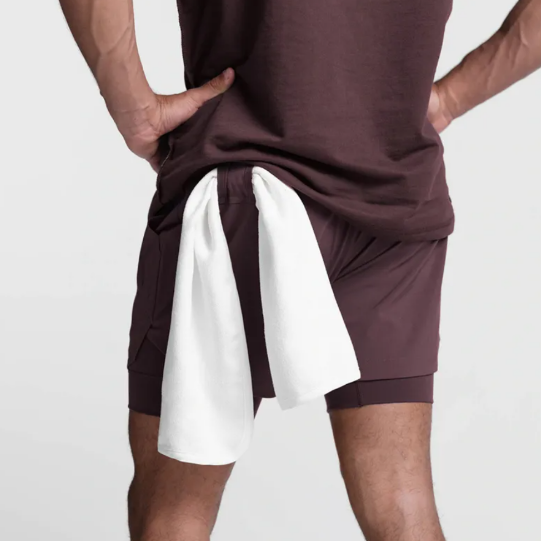 Empire Men's Shorts: Experience the perfect fusion of style and functionality with quick-dry technology, a double-layer design, and functional pockets. Quick dry efficiency for optimal comfort during workouts and outdoor activities. Double layer design for enhanced support and relaxed style. Functional pockets for on-the-go convenience. Elevate your activewear collection with Empire Men's Shorts – where practicality seamlessly meets fashion.