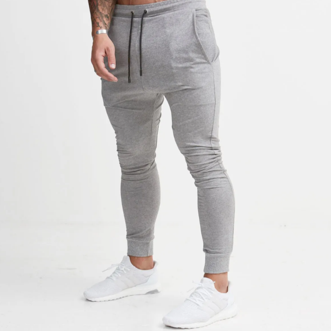 The Finley Slim Fit Sweatpants: Crafted from soft cotton jersey for maximum comfort. Functional pockets add everyday convenience. Slim fit design for modern and stylish casual wear. Elevate your wardrobe with The Finley Sweatpants.
