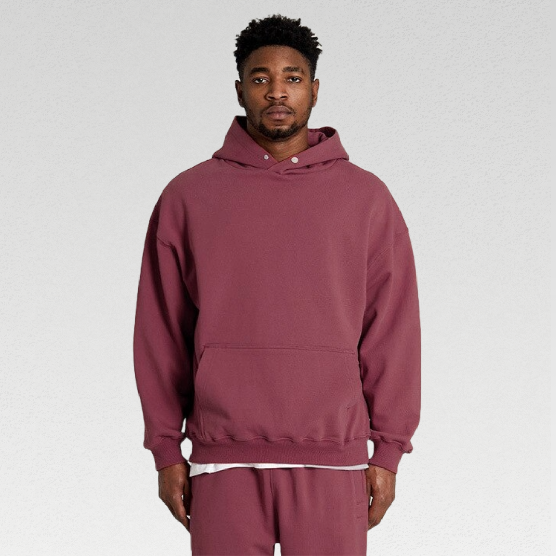 Durable and breathable men's hoodie made from premium cotton fabric, perfect for rest days or gym sessions, featuring an oversized fit, large hood, and front pocket for ultimate comfort and style.