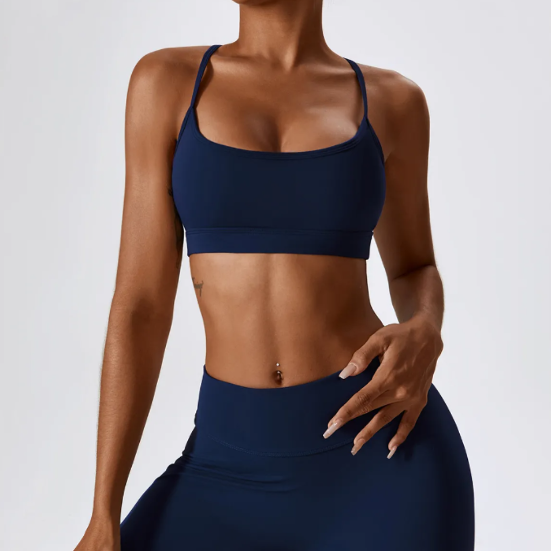 Marianna Cross Back Sports Bra: Elevate Your Workout Experience with Fashion-Forward Design and High-Performance Functionality - Stylish Cross Back, Adjustable Straps, and Durable Nylon/Spandex Blend Built to Last. Experience Unparalleled Comfort and Support with Optimal Breathability. Redefine Your Athletic Wardrobe with Marianna.