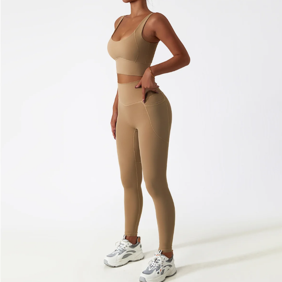 Helena Set - Elevate your workout experience with this stylish and functional activewear set. The breathable comfort, quick-dry technology, compression waistband, and high-waisted leggings with pockets redefine activewear elegance. Stay cool, confident, and convenient during your active pursuits.
