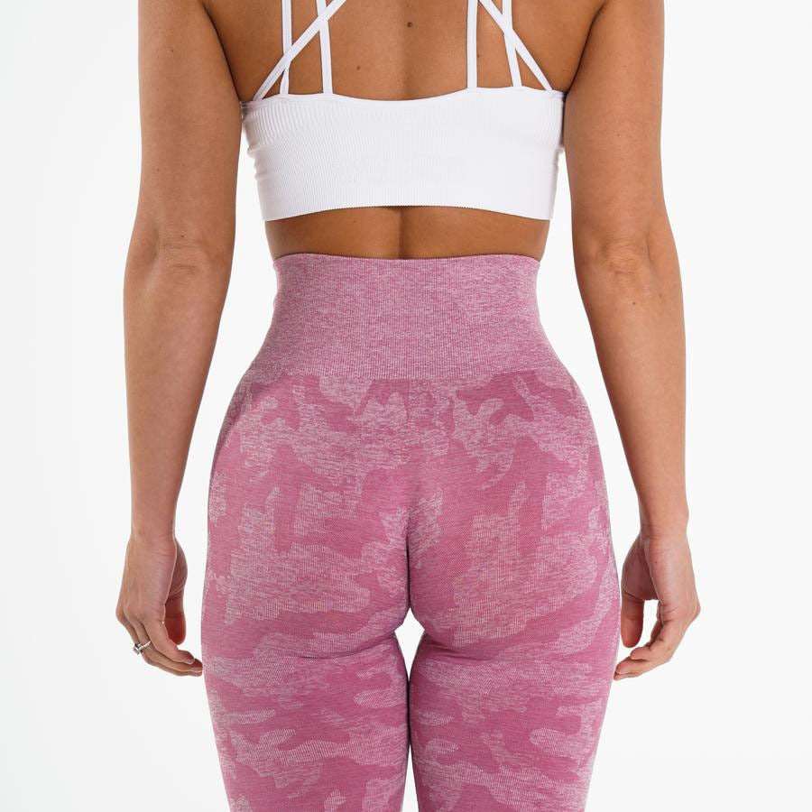 Elevate your workout wardrobe with our Camo Leggings, crafted from a premium blend of 80% nylon and 20% spandex. These leggings offer both durability and comfort, featuring a seamless design that allows you to power through your toughest workouts effortlessly. The flattering fit ensures confidence and support, making them the perfect choice for a variety of exercises. Embrace the unique camo print and make a statement in your fitness routine.