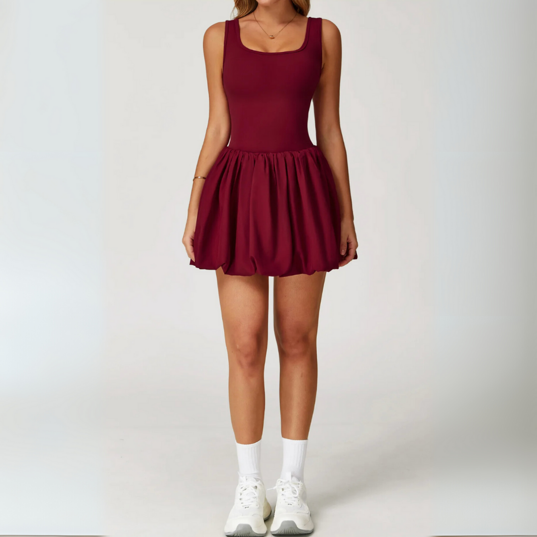 THE BRIM FLARED TENNIS DRESS