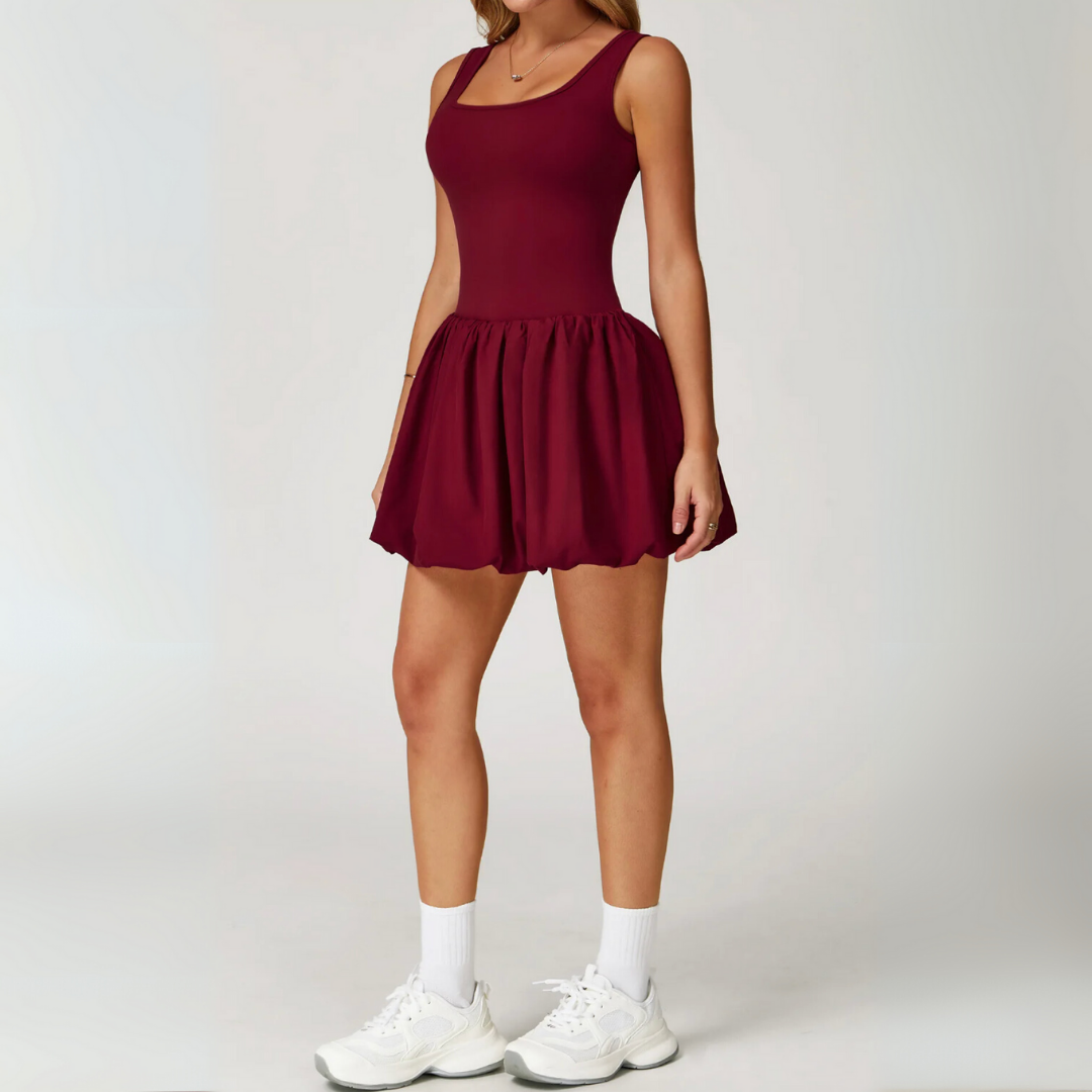 THE BRIM FLARED TENNIS DRESS
