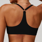 BRIM SEAMLESS RACERBACK SPORTS BRA