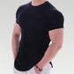 Gravity Crew Neck Tee: Stay cool and comfortable during intense workouts. High-quality herringbone cotton and polyester blend. Slim fit, crew neck, curved hem, and rolled sleeves for a flattering and stylish look. Elevate your workout wardrobe with Gravity Tee.