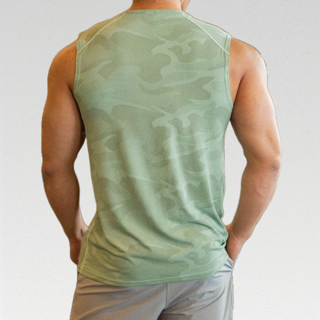 Elevate your workouts with the Active Crew Neck Singlet - Lightweight, quick-drying, and breathable fabric for maximum comfort. Muted camo print adds style without compromising performance. Sweat in style with a full range of motion, making it the perfect addition to your workout wardrobe.