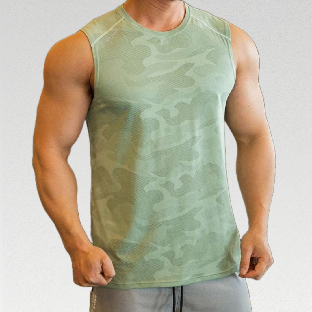 Elevate your workouts with the Active Crew Neck Singlet - Lightweight, quick-drying, and breathable fabric for maximum comfort. Muted camo print adds style without compromising performance. Sweat in style with a full range of motion, making it the perfect addition to your workout wardrobe.