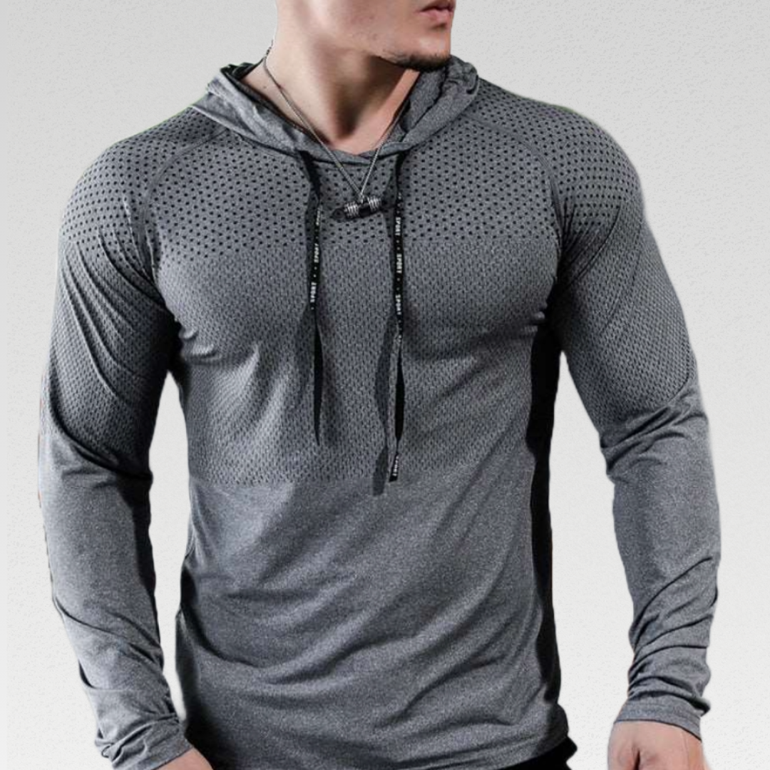 Advance Slim Fit Hoodie – Lightweight polyester fabric with stretch for comfort. Quick-dry material ensures freshness during intense workouts. Flattering slim fit design with drawstring hood for a stylish and functional gym essential. Upgrade your gym wardrobe with comfort and style.