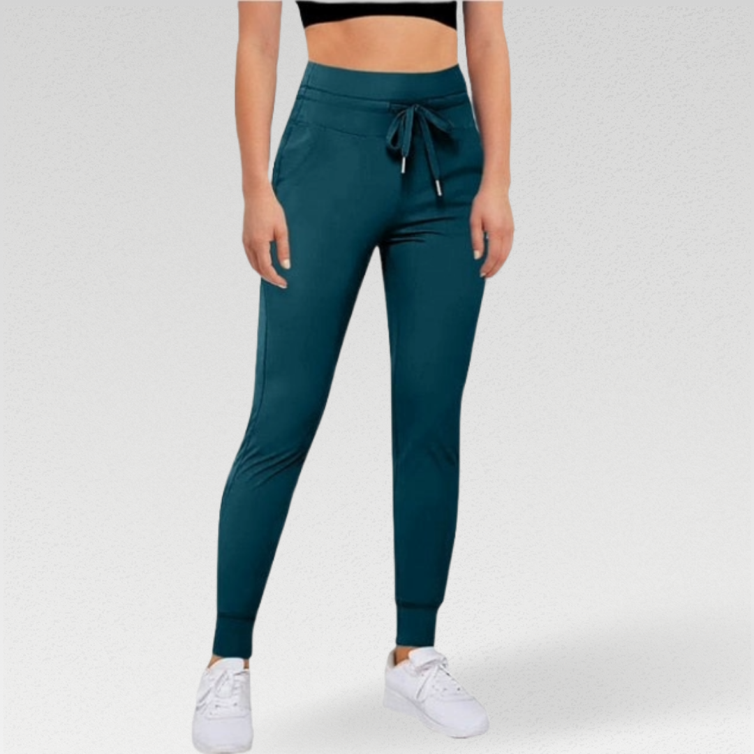 Lucid Slim Fit Sweatpants: Elevate Your Style and Comfort Effortlessly - Unmatched Comfort with High-Waisted Design, Breathable Excellence for Gym or Rest Days, and Flattering Slim Fit with Customizable Elastic Drawstring Waistband. Fall in Love with Fashion and Function in Every Step. Upgrade Your Wardrobe with the Perfect Blend of Style and Comfort.