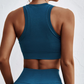 Thalia Sports Bra - Breathable, quick-dry spandex for staying fresh. Seamless design for comfortable support. Removable pads for customizable style and functionality. Elevate your workout with The Thalia Sports Bra.