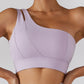 Demeter Tennis Skirt Set - Elevate your sports style with this two-piece activewear set. The high waisted tennis skirt with privacy shorts and one-shoulder sports bra provide maximum comfort, breathability, and durability for tennis, golf, running, and more. Made from a high-quality nylon/spandex blend.