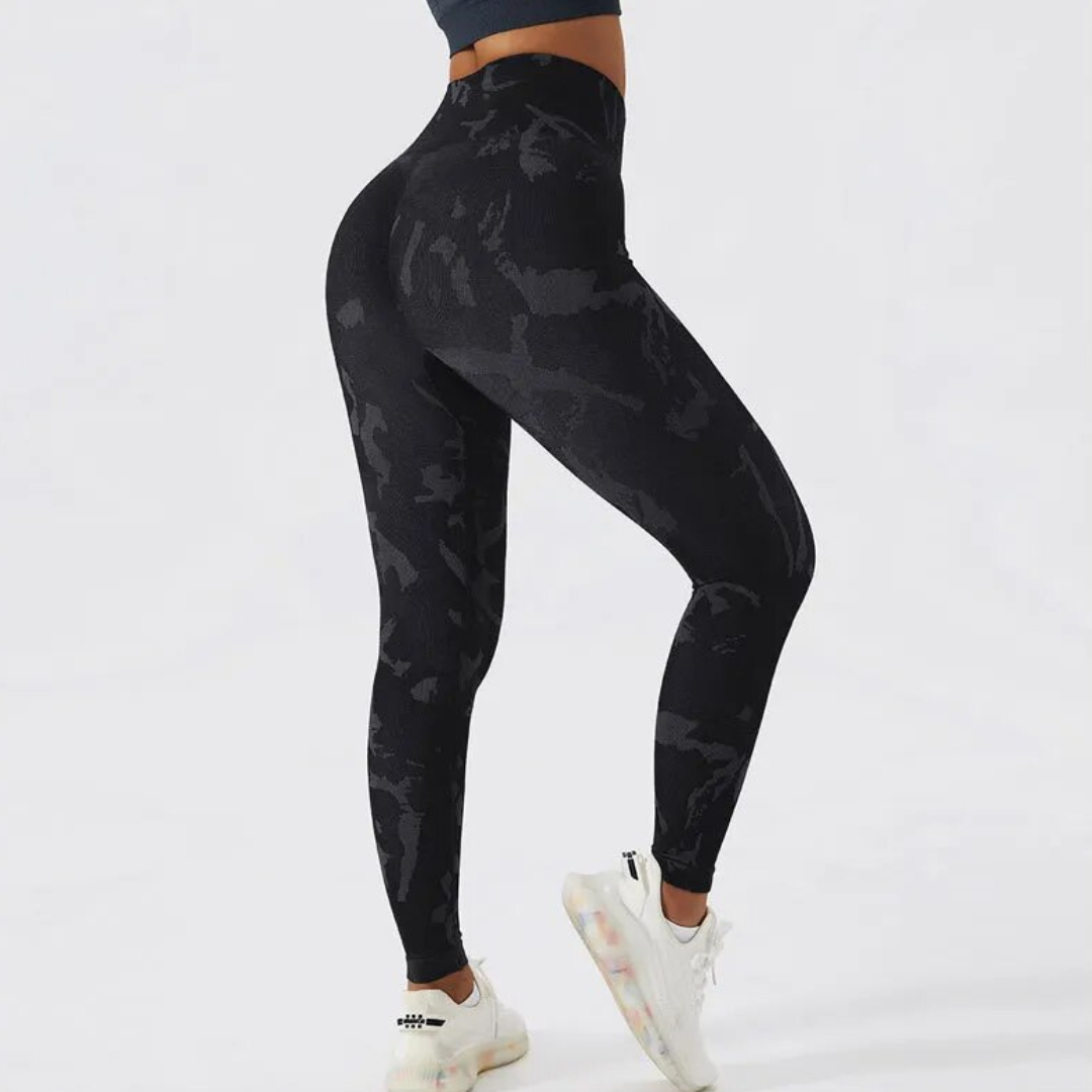 Elevate your activewear collection with our Ripple High Waisted Leggings, a perfect blend of style and performance. Crafted with Polyester, Lycra, Nylon, and Spandex, these leggings embrace your body like a second skin. The seamless design ensures unparalleled comfort and a sleek silhouette, making them perfect for intense workouts. Built to last, these leggings offer exceptional durability, so you can confidently tackle any fitness routine. 