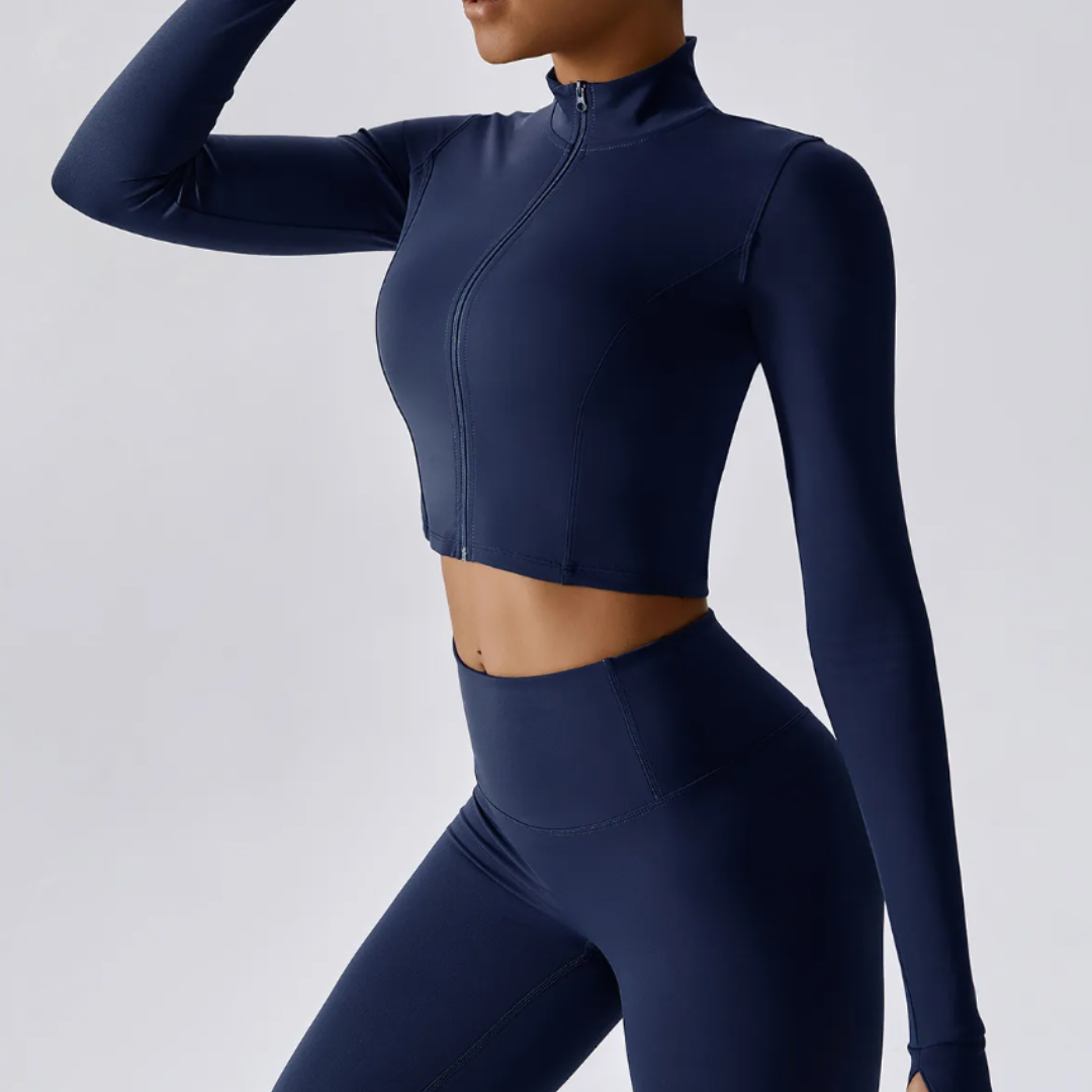 The Leticia Cropped Jacket: Future of Fashion and Functionality - Cutting-Edge Nylon/Spandex Blend, Breathable, Quick-Dry Technology, Durable Compression Fit, and Stylish Thumb Holes. Elevate Your Active Lifestyle with Unmatched Comfort and Flexibility.