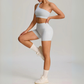 THE MURMUR ONE-SHOULDER SPORTS BRA AND SHORTS SET