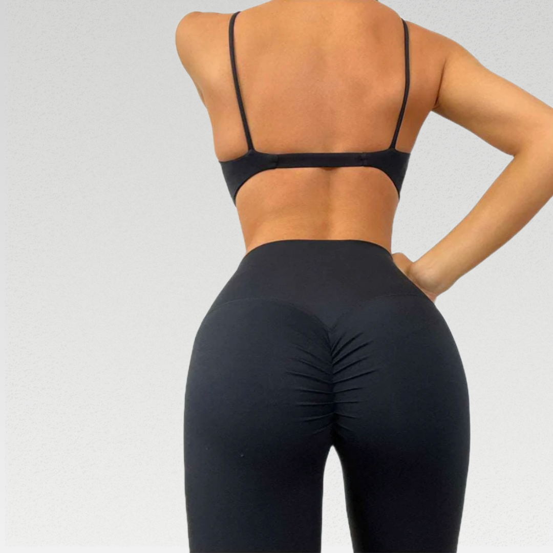 Calypso Scrunch Butt Leggings: Part of a stunning two-piece active wear set. Durable nylon/spandex blend for breathability, quick-drying, and lasting performance. Seamless and breathable, ensuring comfort during your workout. High-quality construction designed for durability. Sweat in style with this breathable and quick-dry poly/spandex blend, keeping you fresh and dry throughout your workout.