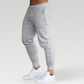 Dallas Cotton Blend Sweatpants: High-quality men's sweatpants made from a durable cotton and polyester blend for breathability and long-lasting wear. Maximum comfort and flexibility for workouts or runs. Built to last with high-quality, durable materials. Features drawstring waistband, pockets, and cuffed ankles for a flattering fit. A must-have in a range of colors for versatile style and comfort.