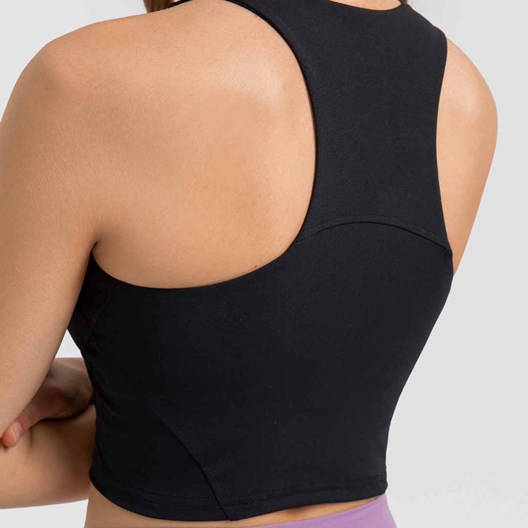 Venice Crop - Women's gym singlet made from a breathable and sweat-wicking nylon/spandex blend, featuring a built-in sports bra for maximum support and comfort. Stylish, cropped, and fitted design for both streetwear and gym wear, ensuring you look and feel your best during intense workouts.