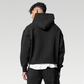 Durable and breathable men's hoodie made from premium cotton fabric, perfect for rest days or gym sessions, featuring an oversized fit, large hood, and front pocket for ultimate comfort and style.