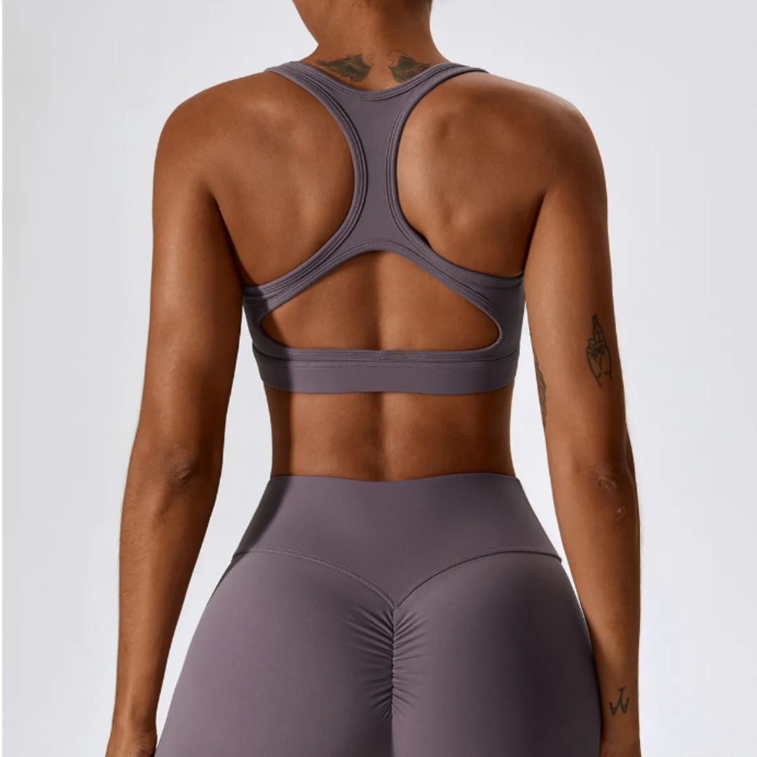 Marianna Keyhole Sports Bra: Elevate Your Workout with Fashion-Forward Design and High-Performance Functionality - Built to Last with Durable Nylon/Spandex Blend, Breathable Comfort for Efficient Airflow, and Removable Pads for Customized Support. Redefine Your Athletic Wardrobe with Marianna.