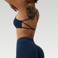 Cali Set - Elevate your workout with high-waisted shorts and cross back sports bra. Quick-dry, breathable, and stylish for a comfortable and fashionable gym session.
