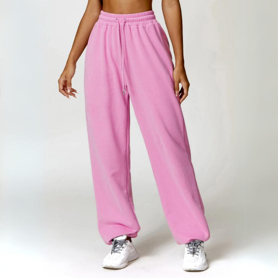 Talena Sweatpants - Premium cotton/poly blend for ultimate softness and durability. Elastic drawstring waistband for tailored comfort. Cuffed ankles for stylish versatility. Elevate your loungewear experience with the cozy and chic Talena Sweatpants.