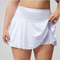 TAURA PLEATED TENNIS SKIRT