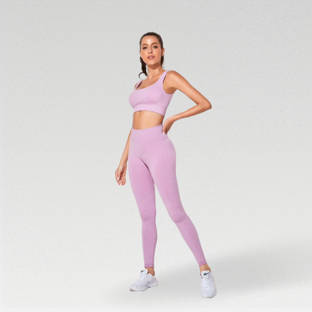 Flow 3 Piece Set: High-quality, sweat-wicking fabric for comfort during intense workouts. Seamless design, removable pads, and stylish support. Includes high-waisted leggings, supportive sports bra, and cropped long-sleeve workout shirt. Elevate your fitness wardrobe with the Flow Set