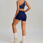 THE MURMUR ONE-SHOULDER SPORTS BRA AND SHORTS SET