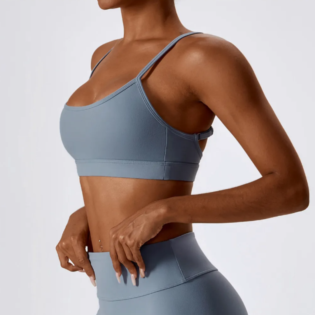 Marianna Cross Back Sports Bra: Elevate Your Workout Experience with Fashion-Forward Design and High-Performance Functionality - Stylish Cross Back, Adjustable Straps, and Durable Nylon/Spandex Blend Built to Last. Experience Unparalleled Comfort and Support with Optimal Breathability. Redefine Your Athletic Wardrobe with Marianna.