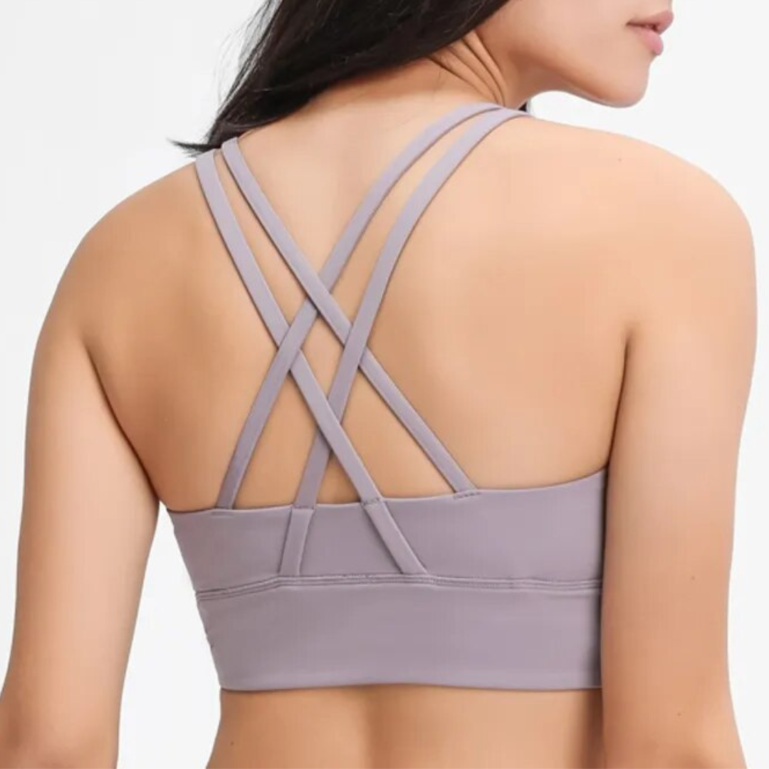 Rayna Sports Bra: Innovation, Style, and Performance Combined. Double Brushed Fabric with Mesh Panel for Maximum Breathability. Crafted from Breathable Nylon/Spandex Blend for Unbeatable Comfort and Flexibility. Stay Stylish, Stay Supported.