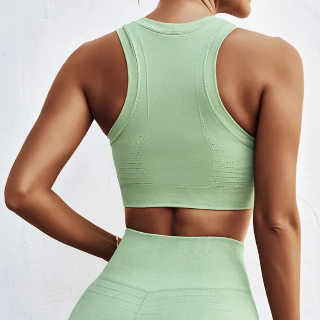 Thalia Sports Bra - Breathable, quick-dry spandex for staying fresh. Seamless design for comfortable support. Removable pads for customizable style and functionality. Elevate your workout with The Thalia Sports Bra.