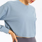 Luna Cropped Sweatshirt: Elevate Your Comfort and Style - Cotton/Spandex Blend for Softness and Flexibility. Stay Comfortable During Workouts with a Butter-Soft Feel. Fall in Love with the Crew Neck, Drop Shoulder, and Adorable Cropped Design. Experience Workout Wear That Feels Like a Cloud.