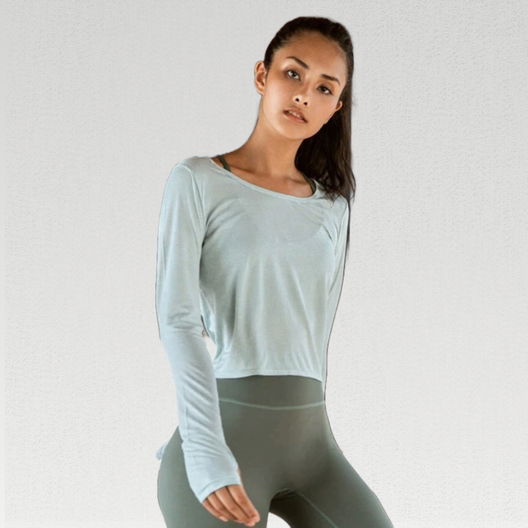 Delilah Yoga Shirt: The perfect addition to your workout wardrobe. Durable nylon/spandex blend for ultimate comfort and style. Stay comfortable with breathable material designed for intense workouts. Built to last with high-quality, durable fabric. Sweat in style with moisture-wicking material for a dry and comfortable fitness experience.