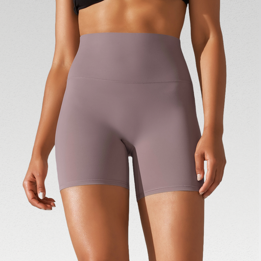 Belina High Waisted Shorts - Elevate your workout experience with unmatched durability and style. Crafted to withstand intense workouts, these shorts are a reliable addition to your fitness attire. Quick-dry fabric ensures you stay comfortable and dry, while the high-waisted design offers both support and a fashionable look. Feather-light and seamless, the Belina shorts provide a smooth and comfortable fit, allowing you to focus on your fitness routine without distractions.