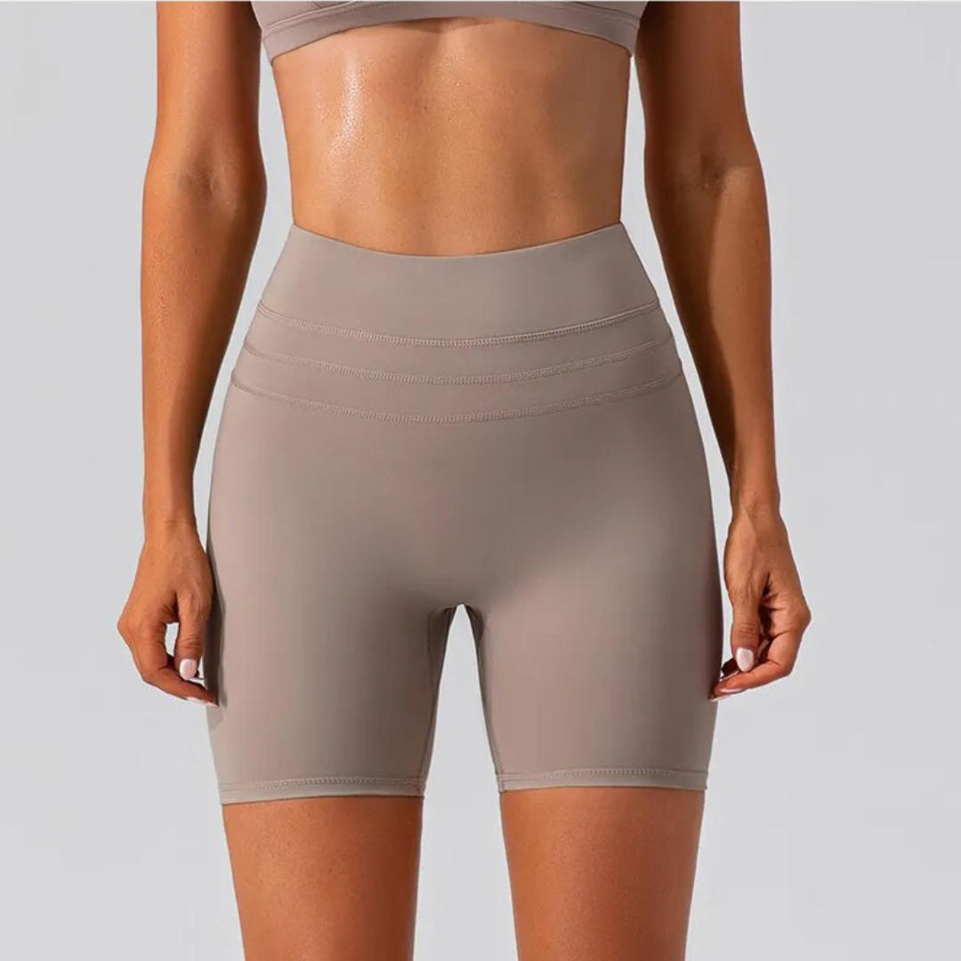 Athena Scrunch Butt Gym Shorts – Style and comfort combined. Premium nylon/poly blend for quick drying, breathable material, and durability. Sweat in style with confidence, knowing your activewear works as hard as you do. Built to last, these shorts are your perfect workout companion. Conquer your workouts with Athena Shorts.
