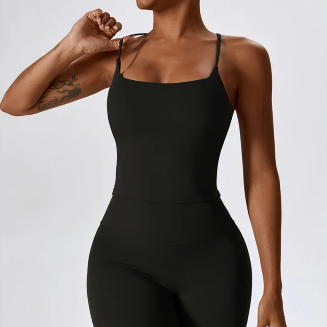 The Hera Singlet - Crafted from a blend of nylon and spandex, featuring removable pads and seamless elegance. Redefine your fitness experience with this activewear. Explore Hera now for unmatched comfort and personalized support.