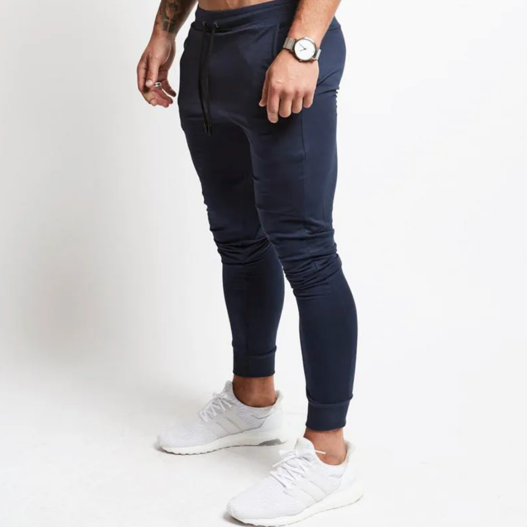 The Finley Slim Fit Sweatpants: Crafted from soft cotton jersey for maximum comfort. Functional pockets add everyday convenience. Slim fit design for modern and stylish casual wear. Elevate your wardrobe with The Finley Sweatpants.