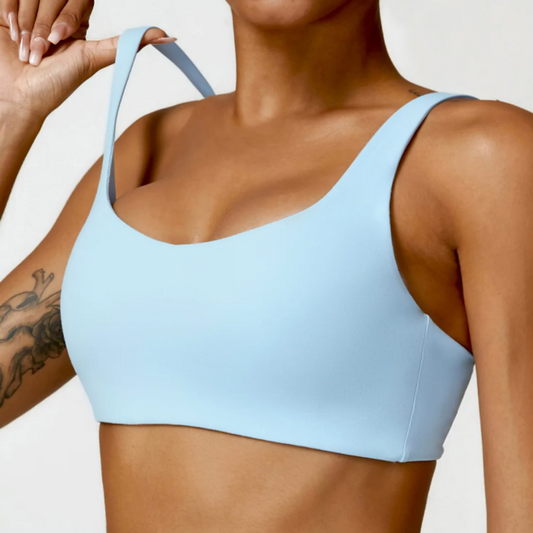 The Adelaide Sports Bra – Premium nylon/spandex blend, quick-dry technology, breathable design, removable pads, and medium support. Elevate your activewear with ultimate comfort and customizable features for a stylish and functional workout experience.
