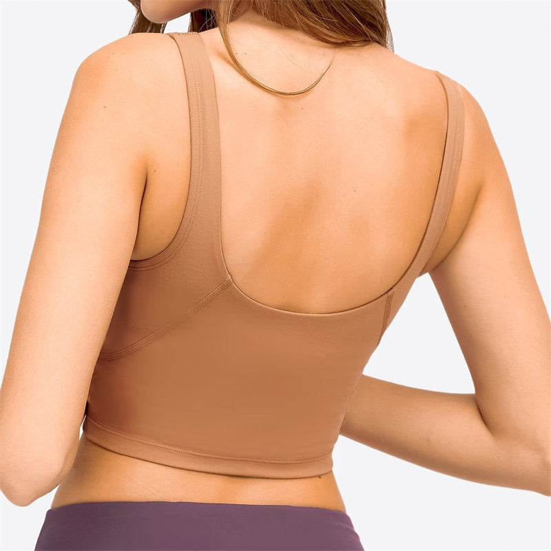 Louise Singlet: The Ultimate Women's Gym Essential - Nylon/Spandex Blend for Comfort, Durability, and Style. Built-in Sports Bra for Maximum Support, Breathable and Sweat-Wicking Material for Comfortable Workouts. Upgrade Your Workout Wardrobe with the Perfect Blend of Comfort, Durability, and Style.