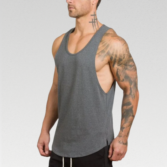 Omega Singlet - Unleash Your Workout Potential with 100% Cotton Comfort, Stylish Crew Neck, Low Cut Sleeves, and Curved Hem. Elevate Your Confidence in Every Rep.