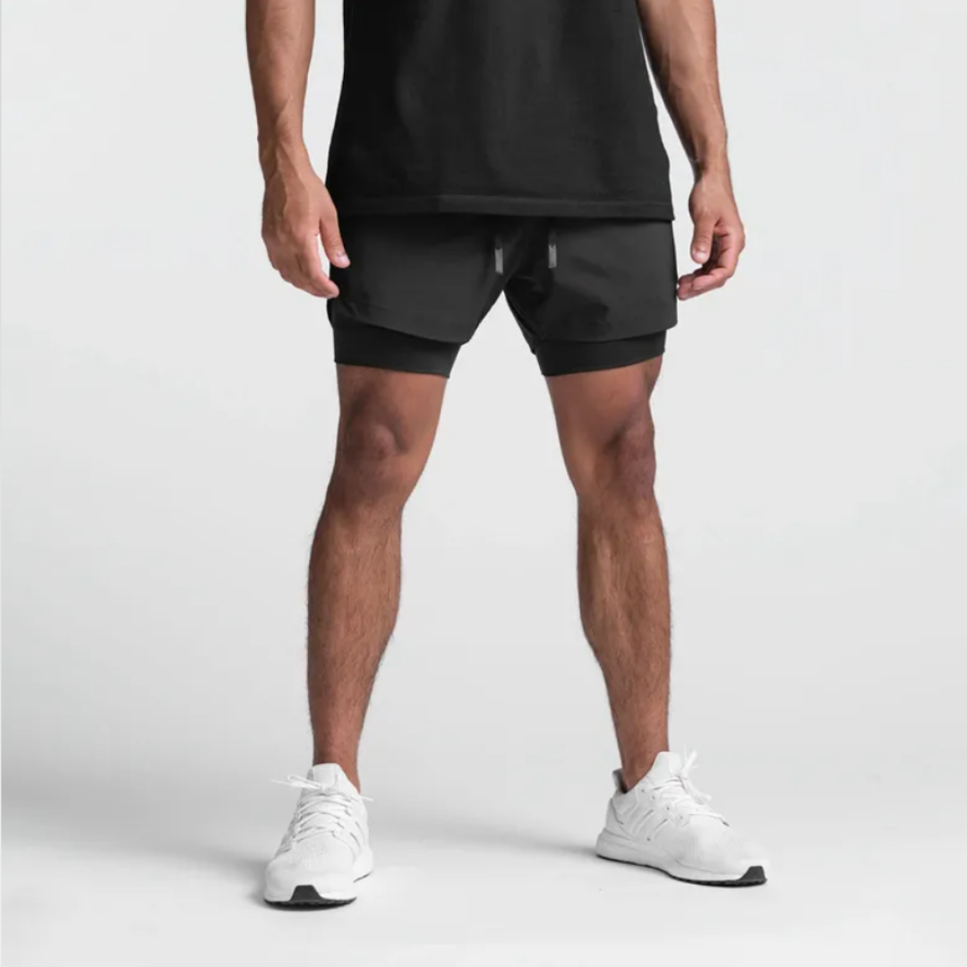 Empire Men's Shorts: Experience the perfect fusion of style and functionality with quick-dry technology, a double-layer design, and functional pockets. Quick dry efficiency for optimal comfort during workouts and outdoor activities. Double layer design for enhanced support and relaxed style. Functional pockets for on-the-go convenience. Elevate your activewear collection with Empire Men's Shorts – where practicality seamlessly meets fashion.