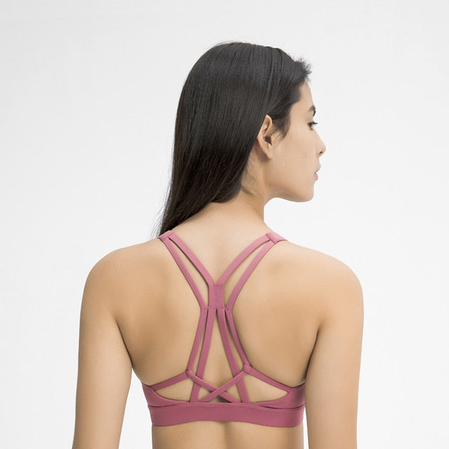 Introducing the Montana Sports Bra – Where Style Meets Function. This Medium Support Bra with Intricate Back Detailing is Ideal for Low to Medium Impact Workouts. Crafted from Breathable, Moisture-Wicking, and Quick-Drying Nylon/Spandex Blend, It Ensures Comfort and Style Throughout Your Gym Session. Sweat in Style with Unique Features like Removable Pads for Added Convenience.