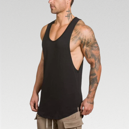 Omega Singlet - Unleash Your Workout Potential with 100% Cotton Comfort, Stylish Crew Neck, Low Cut Sleeves, and Curved Hem. Elevate Your Confidence in Every Rep.